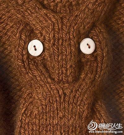 巧妙的毛线花纹编织，配上两粒纽扣，像个猫头鹰