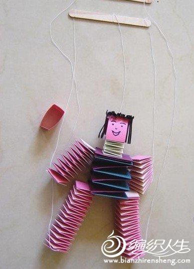 手工折纸弹簧傀儡娃娃的教程