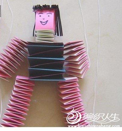 手工折纸弹簧傀儡娃娃的教程