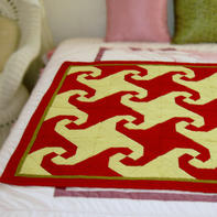 旧线编织的拼布风格棒针小毯子